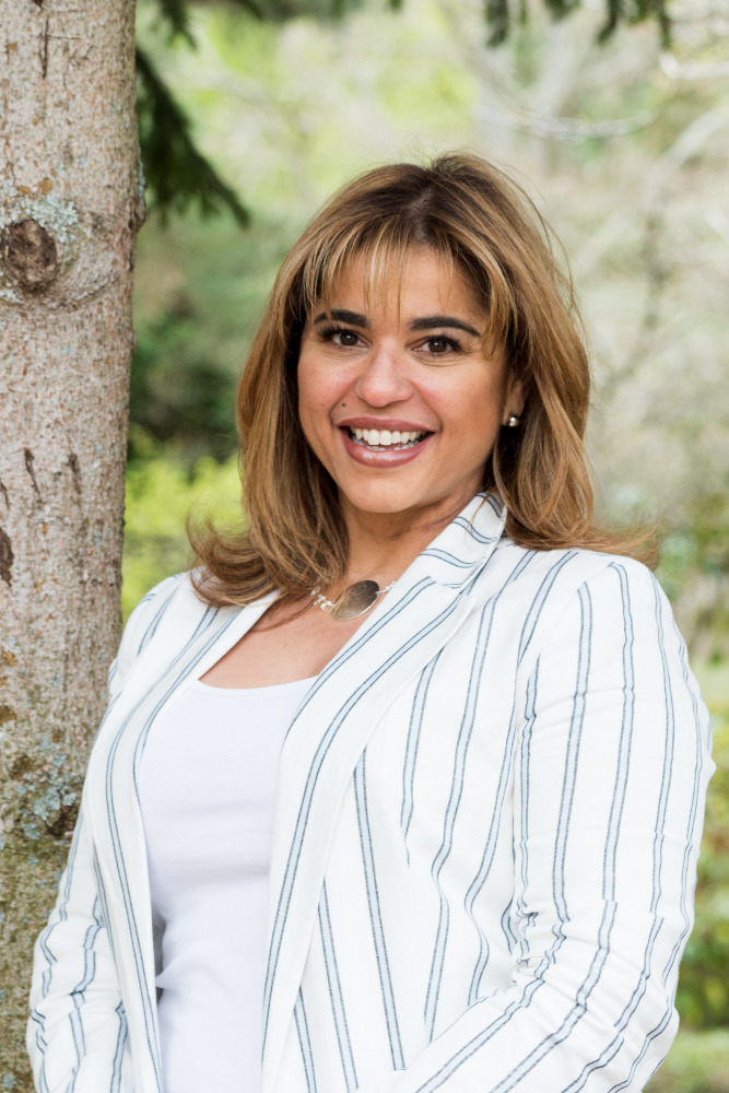 Puertorriqueña en Seattle ayudante asistente.